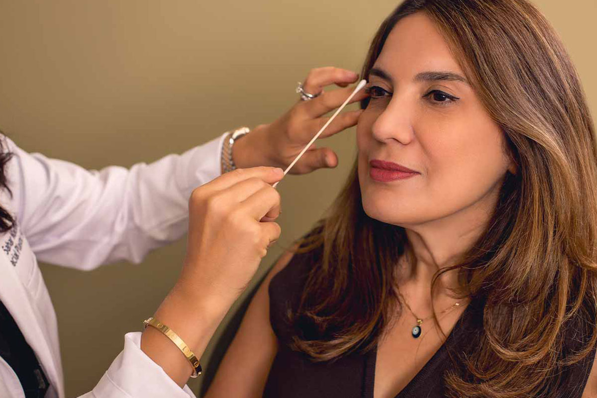 Doctor and patient during consultation for upper blepharoplasty in Chicago